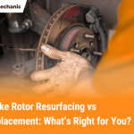 Mechanic checking a brake rotor during resurfacing or replacement process