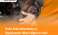 Mechanic checking a brake rotor during resurfacing or replacement process
