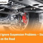 Close-up of car suspension problem showing damaged parts under vehicle with safety warning