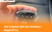 Close-up of a GMC key fob used in a battery replacement guide