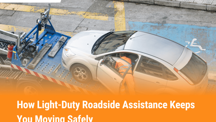 Tow truck helping a stranded car as part of light-duty roadside assistance for battery, tire, fuel, and lockout services.