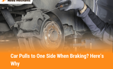 Mechanic inspecting brake caliper and rotor to fix car that pulls to one side when braking
