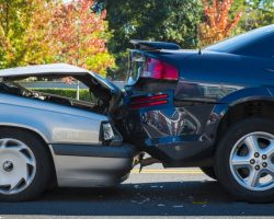 Auto accident involving two cars on a city street