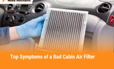 Mechanic showing signs of a bad cabin air filter with visible dirt and dust