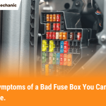 Car fuse box with colored fuses showing signs of wear, representing symptoms of a bad fuse box in a vehicle