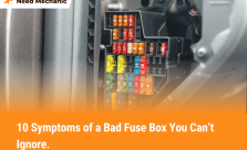 Car fuse box with colored fuses showing signs of wear, representing symptoms of a bad fuse box in a vehicle
