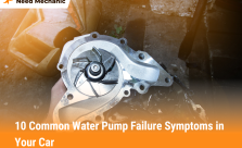 Mechanic holding car part showing symptoms of water pump failure in your car
