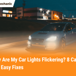 Blue car driving at night with headlights on, illustrating why car lights are flickering and possible causes with easy fixes.