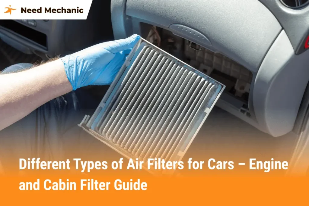Mechanic holding a dirty cabin air filter while replacing it inside a car, showing example of different types of air filters for cars.