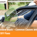 Mechanic repairing a stuck car window by adjusting the glass to fix common issues like motor, regulator, or track problems.