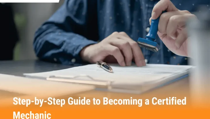 Person stamping certification papers for becoming a certified mechanic