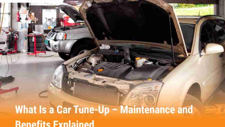 Car in a garage with hood open during tune-up maintenance