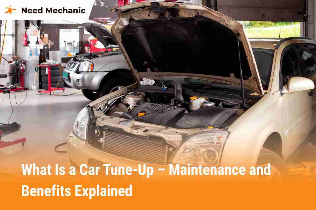 Car in a garage with hood open during tune-up maintenance